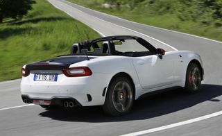 white Abarth 124 Spider on road