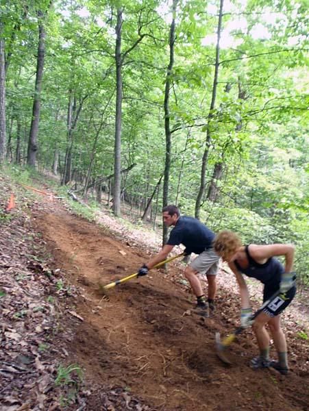 Two racers put in some sweat equity.