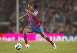 Ronaldinho on the ball for Barcelona against Atletico Madrid in February 2005.