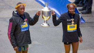 Boston Marathon 2023 winners Evans Chebet and Hellen Obiri hold the trophy together