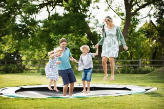 garden play area ideas: trampoline