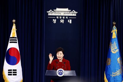 South Korea's president urges tough sanctions against North Korea, hours before a drone flew across the border