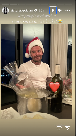 David Beckham with a carafe of wine