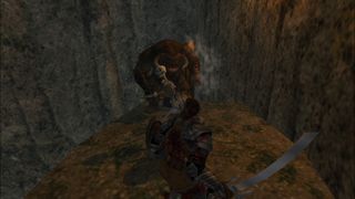 The player battles an enemy in Blade of Darkness