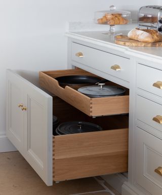 Grey draws with two wooden layers for storage