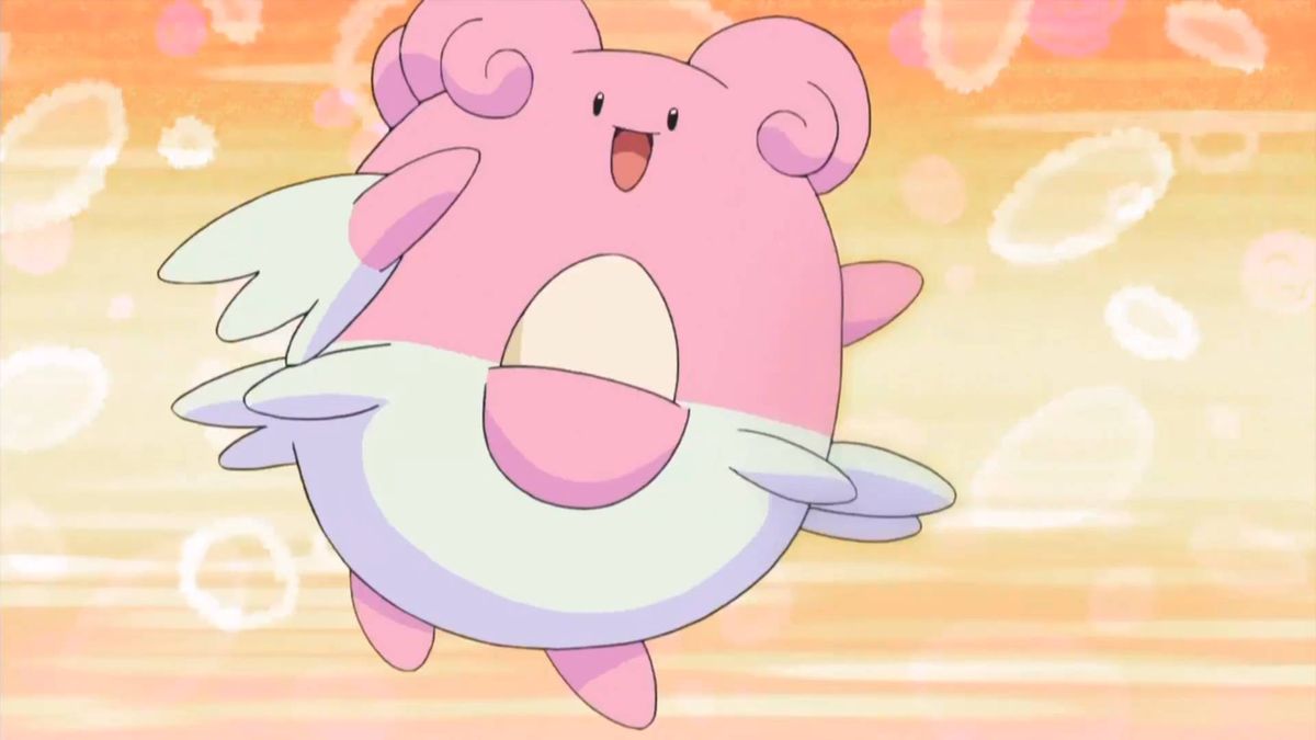 Blissey as seen in the Pokemon anime, smiling with its arms raised.