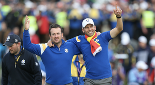 Graeme McDowell and Sergio Garcia celebrate winning the 2014 Ryder Cup