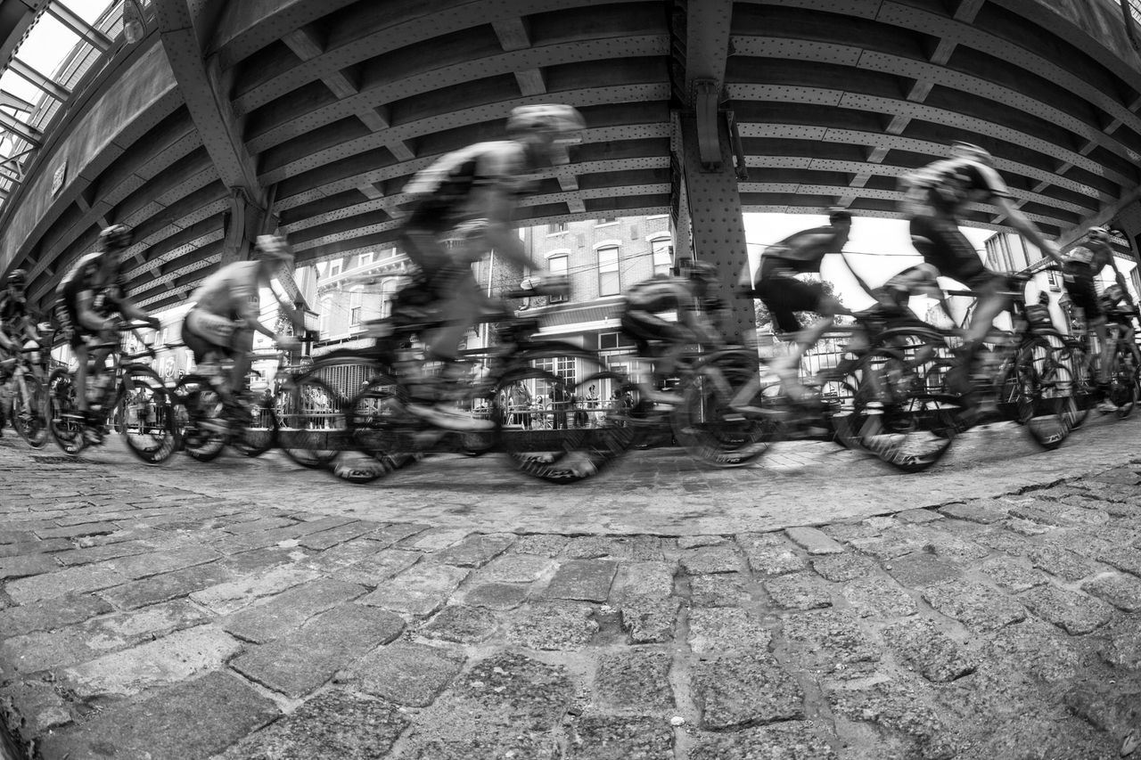 Riders cross the cobbles before making a turn onto the famous "Manayunk Wall" in Philly.