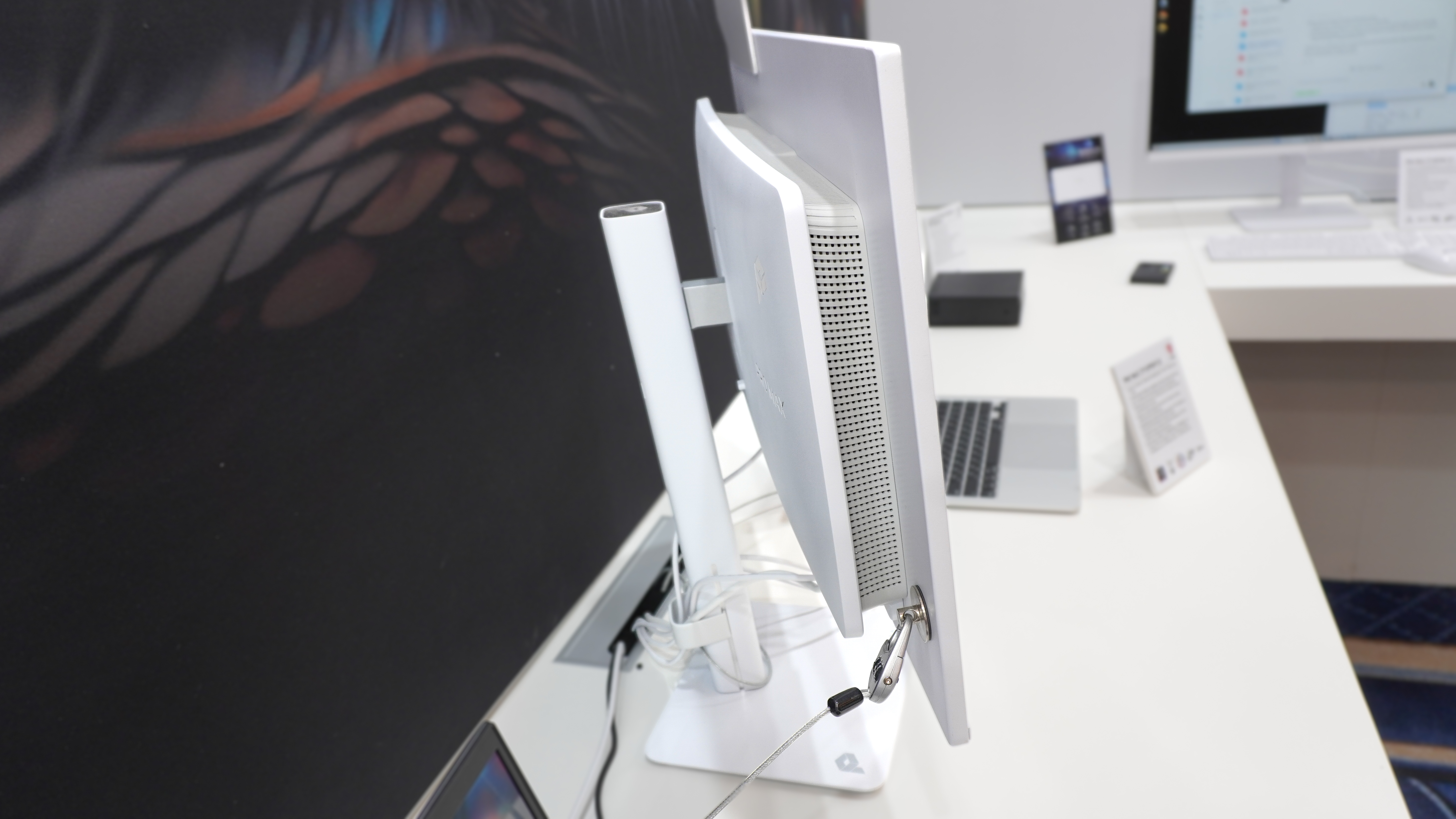 A side view of the backside of the MSI PRO MAX 271UPXW12G monitor