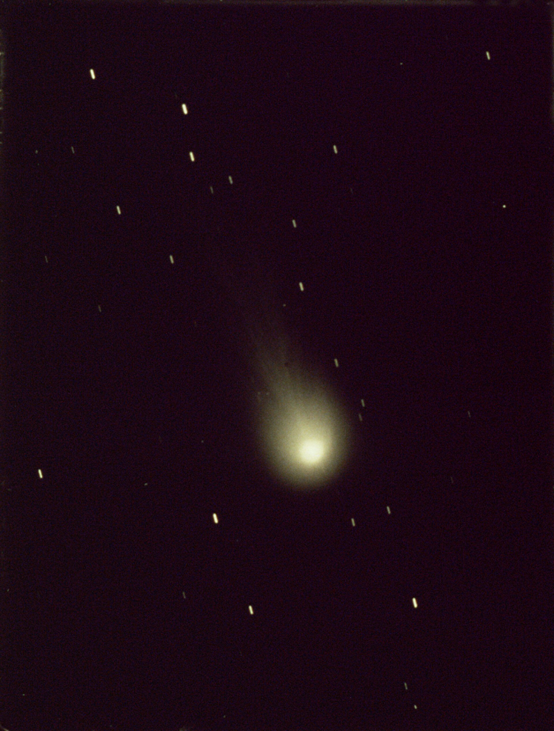 close up view of halley's comet against a background of stars