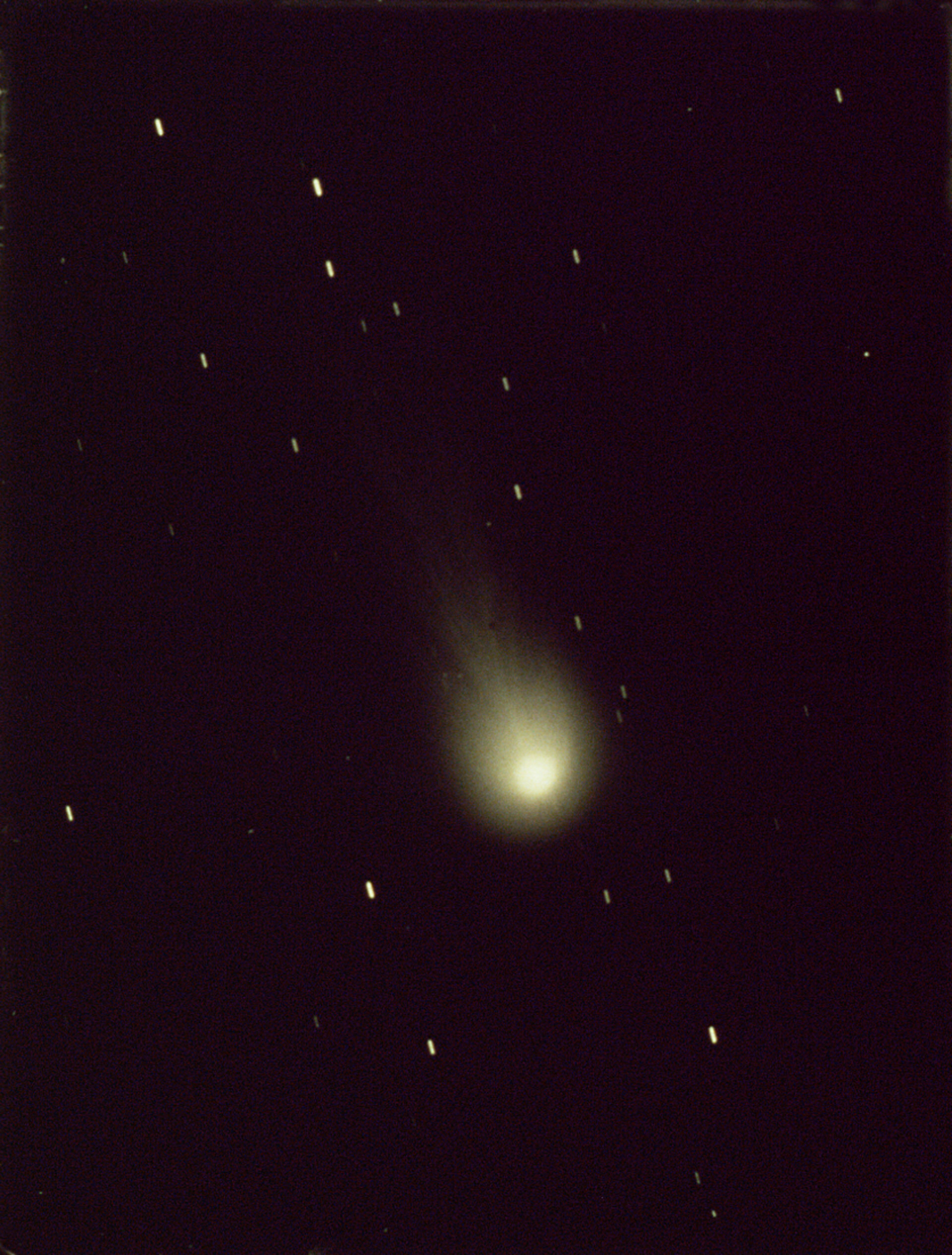 close up view of halley's comet against a background of stars