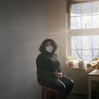 Portait image of Joy Labinjo wearing a mask shot for Joanna Vestey's Masked portrait series