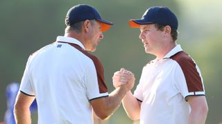 Justin Rose and Robert MacIntyre of Team Europe celebrate on the 15th green during the Saturday afternoon fourball matches of the 2023 Ryder Cup at Marco Simone Golf Club