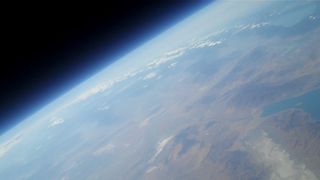 An amateur rocket launched by Team Qu8k looks down at Earth from about 120,000 feet up.