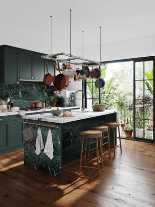 A gray and green kitchen with a green marble kitchen island with a marble countertop with crittal style windows