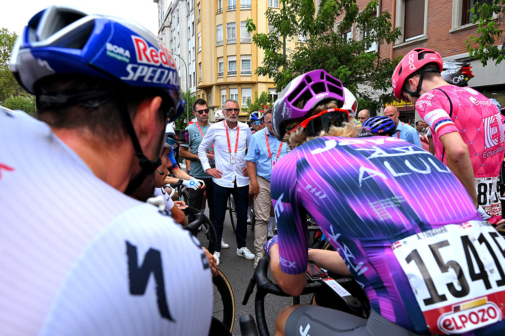 Riders gather to meet with the race organisers before a stage of the 2025 Vuelta a Espa&amp;ntilde;a