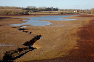 Bewl reservoir in drought conditions with very low water level