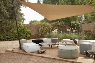 shade sail on patio by Go Modern Furniture