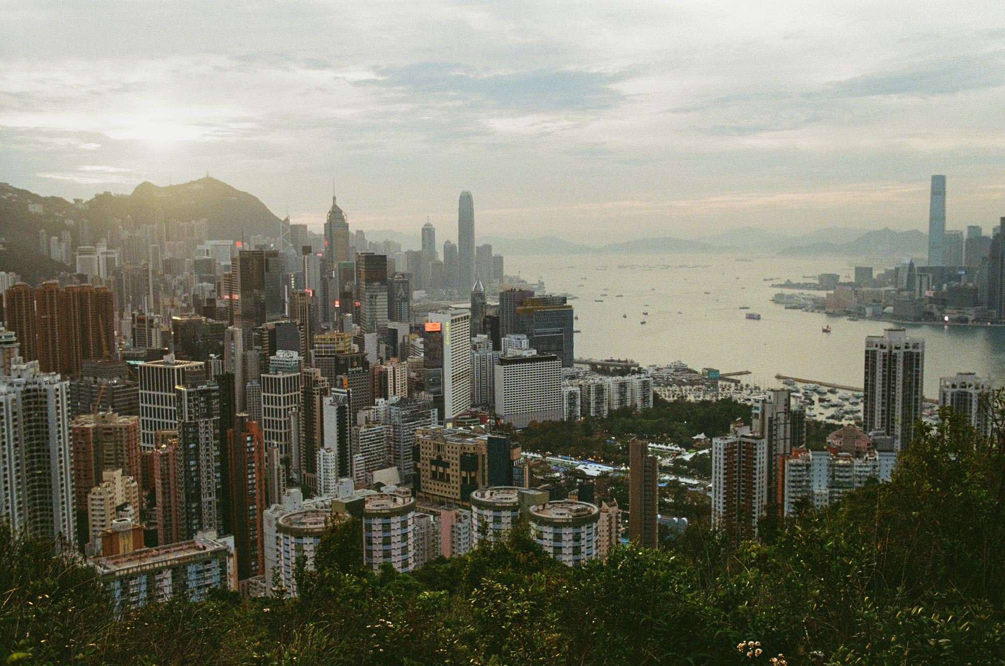 Victoria Harbour as seen from the Red Incense Burner Summit, with Hong Kong Island&amp;rsquo;s Victoria Peak and Central district to the left, and the Kowloon Peninsula to the right