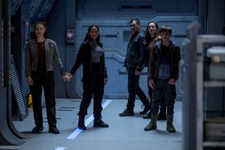 The Robinson family from the Netflix series "Lost in Space 2." From left to right: Penny (Mina Sundwall), Judy (Taylor Russell), John (Toby Stephens), Maureen (Molly Parker) and Will (Maxwell Jenkins).