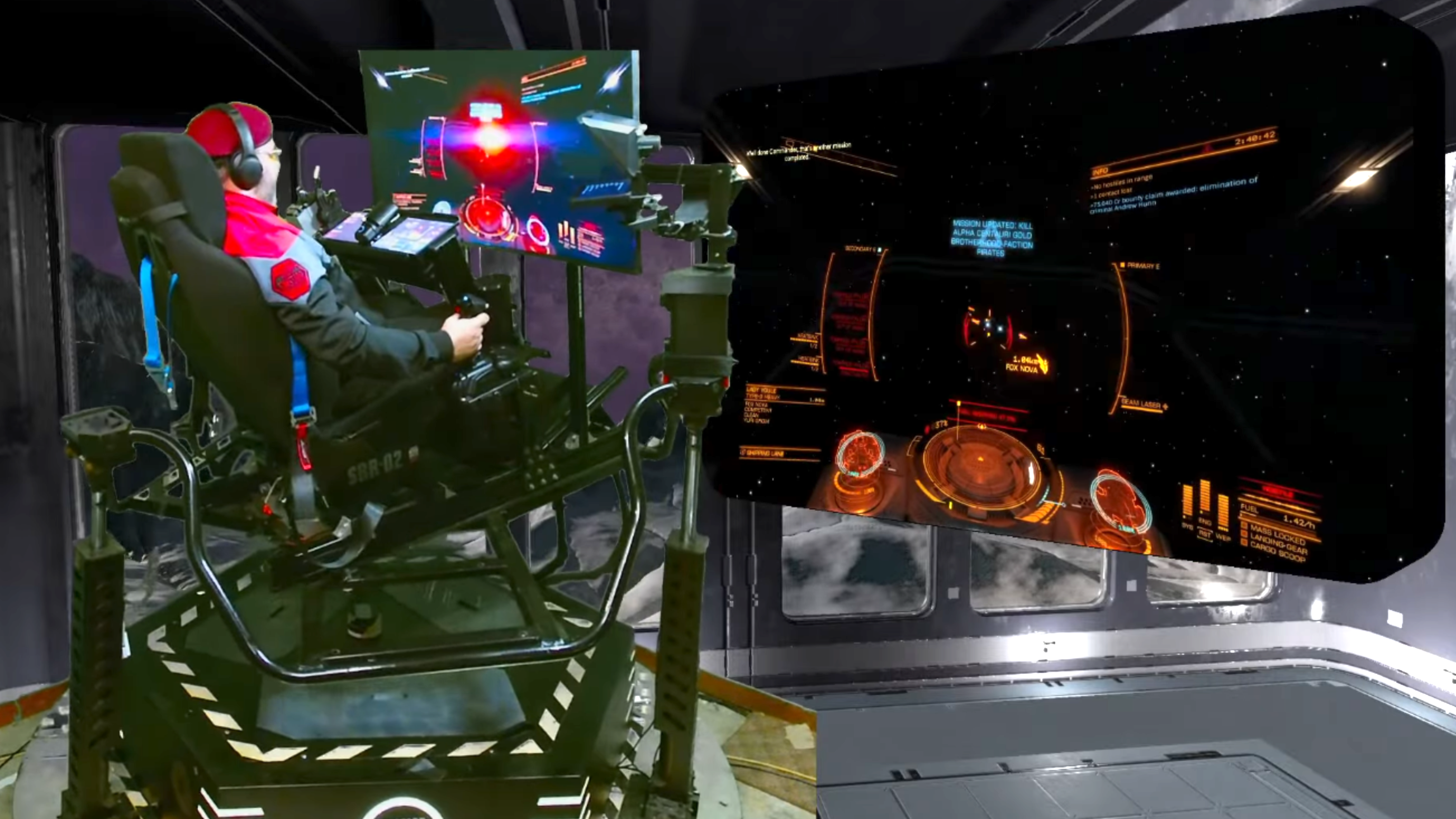 A green-screened picture-in-picture stream of CMDR Wacko piloting the SimStarr rig to play Elite Dangerous.