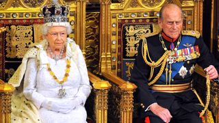 Queen Elizabeth II sits with Prince Philip, Duke of Edinburgh as she delivers her speech during the State Opening of Parliament in the House of Lords at the Palace of Westminster on June 4, 2014 in London, England. Queen Elizabeth II is to unveil the coalition government's legislative programme in a speech delivered to Members of Parliament and Peers in The House of Lords. Proposed legislation is expected to be introduced on a 5p charge for plastic bags in England, funding of workplace pensions, new state-funded childcare subsidy and reforms to speed up infrastructure projects.