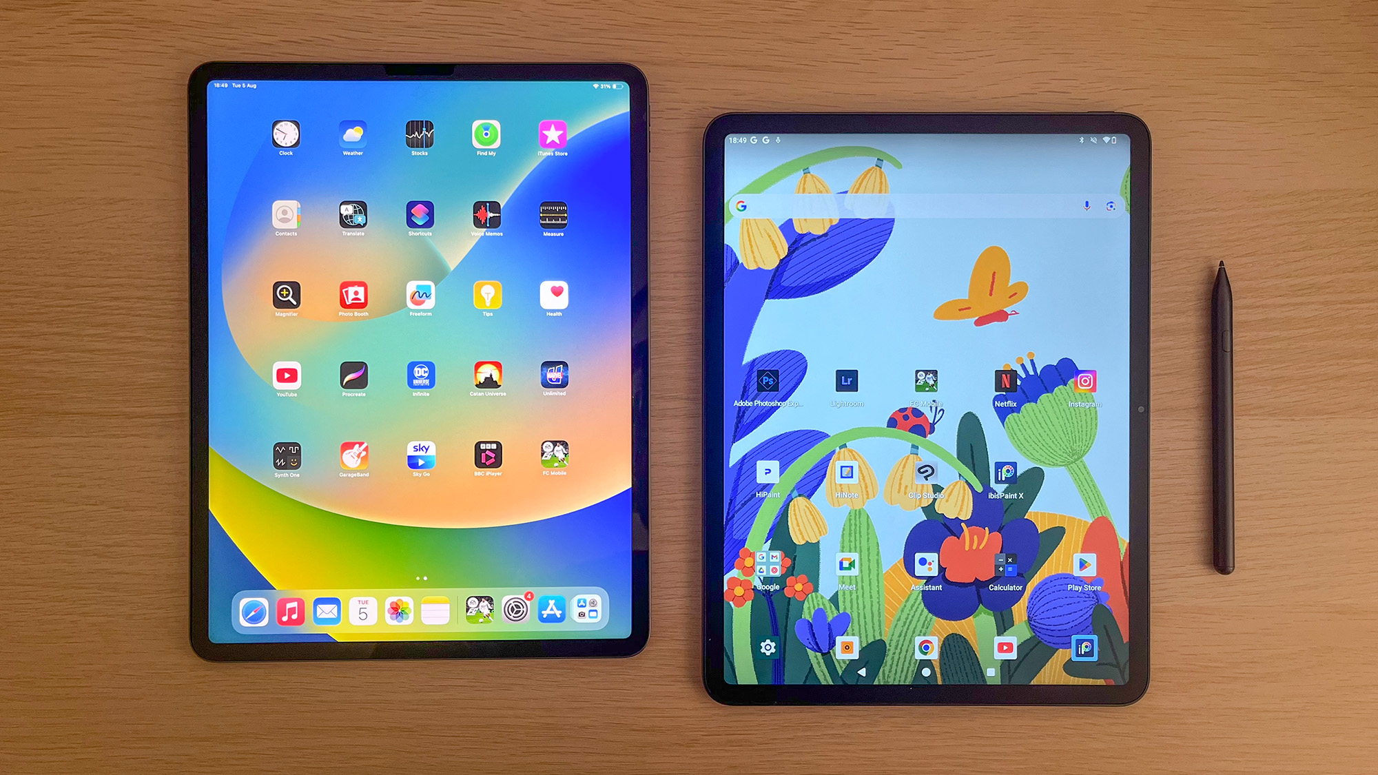iPad Pro M1 (left) next to Huion Kamvas Slate 13 (right)