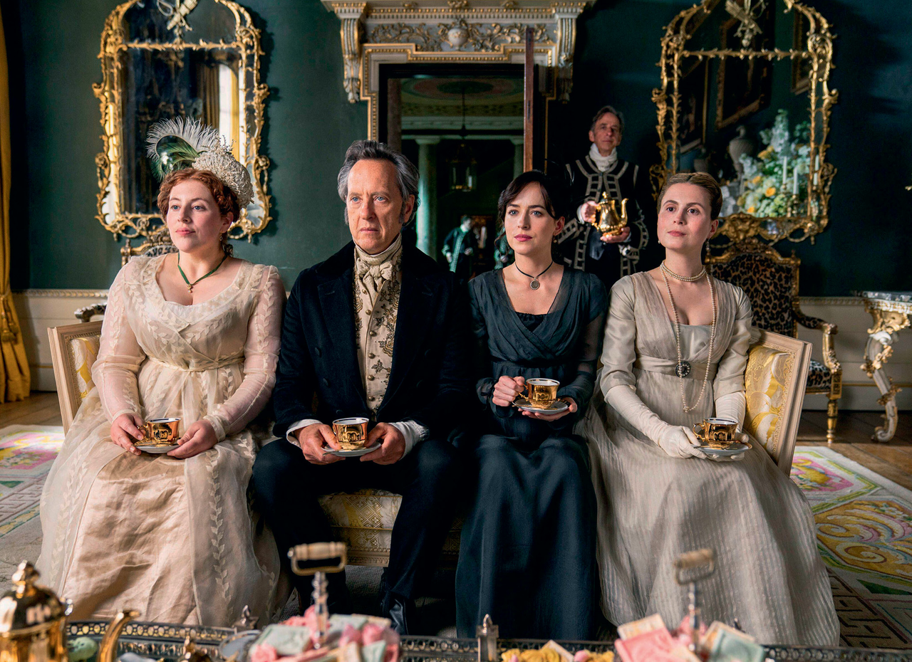 A scene from the Netflix adaptation, starring Lydia Rose Bewley, Richard E. Grant, Dakota Johnson (Anne Elliot) and Yolanda Kettle.