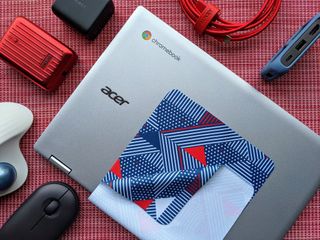 Acer Spin 311 Chromebook with accessories from Aukey, SenseAGE, Logitech, and Uni