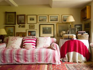 Drawing-room-sofa-in-15th-century-mill-cottage-throw-cushions