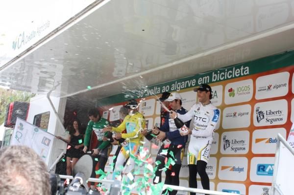 The Volta ao Algarve jersey winners let loose with the bubbly.