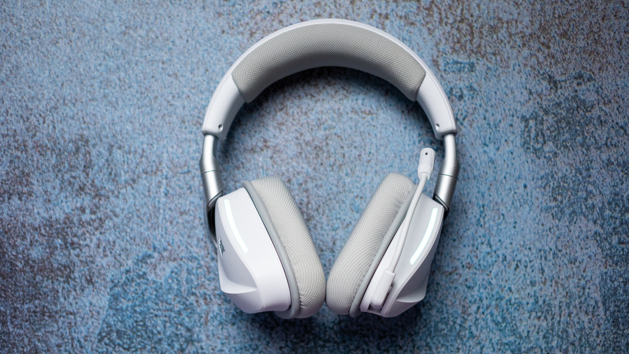 Corsair Void Wireless V2 gaming headset on a blue colorful background