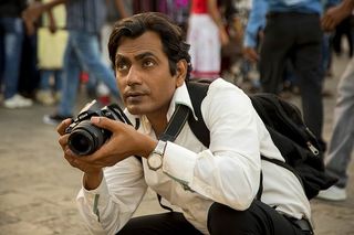 Nawazuddin Siddiqui holding a camera