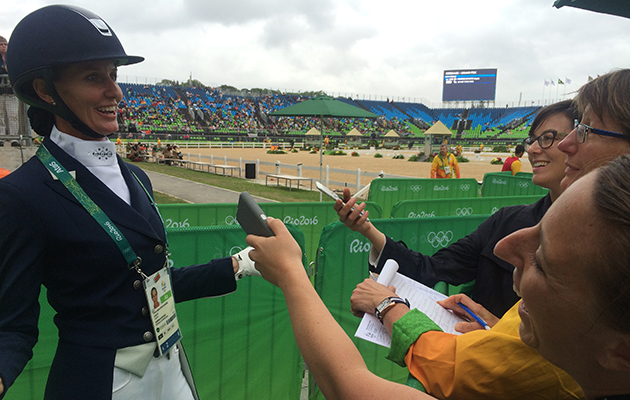 Dressage rider Yvonne Losos de Muniz with journalists