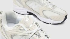 A pair of cream and silver New Balance trainers available from Schuh.