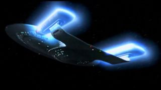 The USS Enterprise-D shown activating its warp drive.