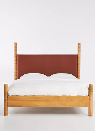 Anthropologie wood post bed.
