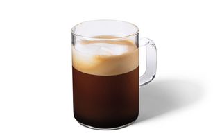 Image of a Starbucks Espresso Macchiato in a glass mug