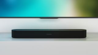 Sonos Beam soundbar face-on positioned below a TV