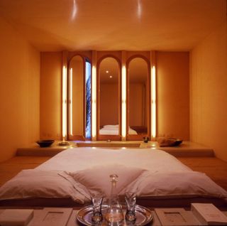 room with semiarched doors and sunset yellow walls