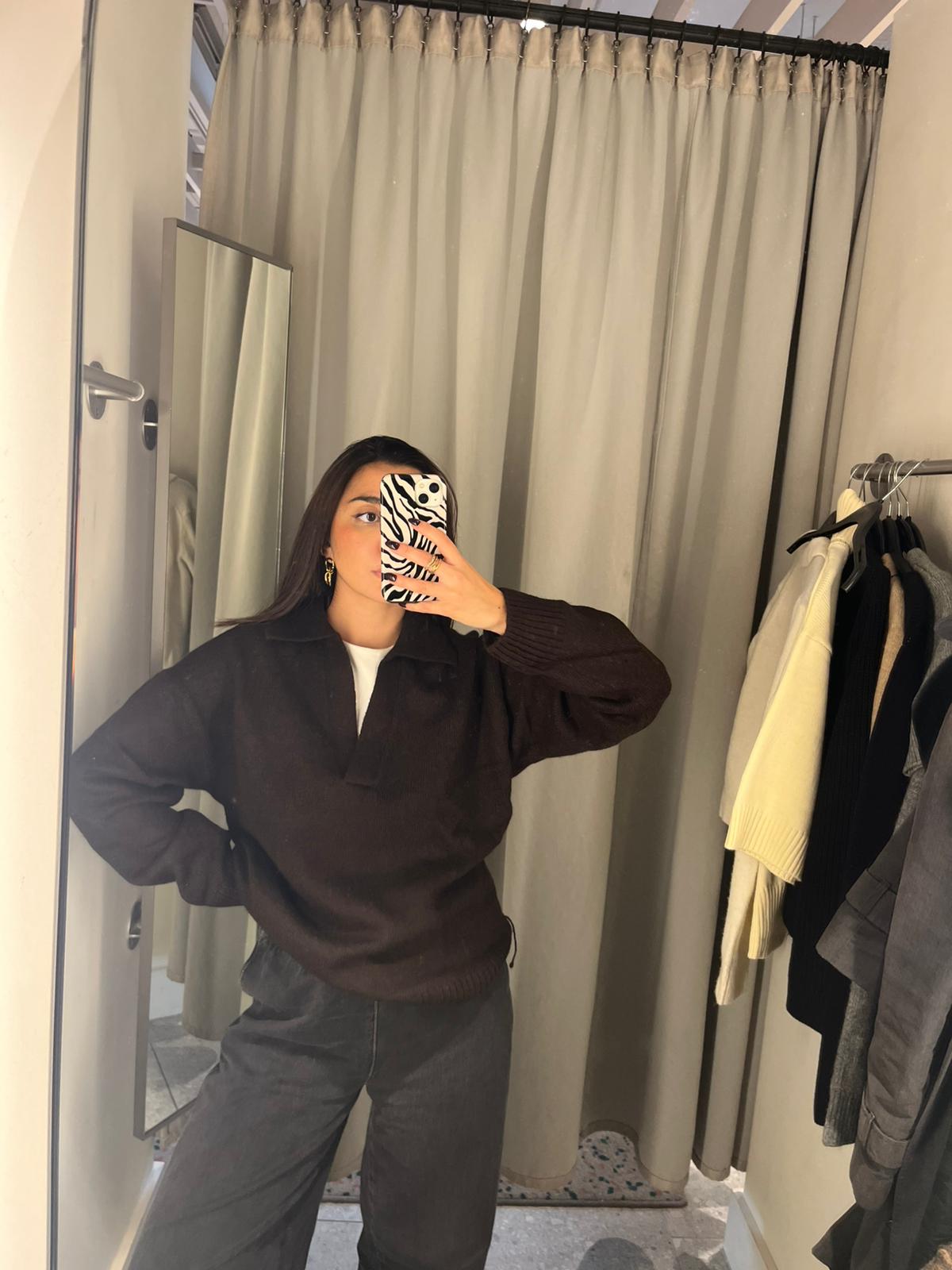 Marina wearing brown knit cardigan