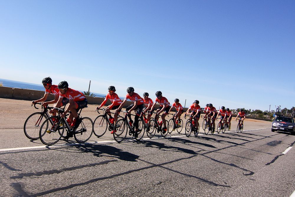 The Rally Cycling team in formation near Malibu Beach.