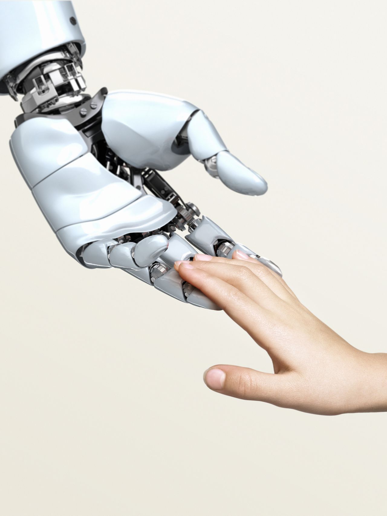 Robot hand touching child&#039;s fingertips