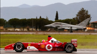 Michael Schumacher racing an Italian Air Force Eurofighter jet at Grosseto air base in 2003