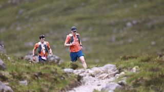 Ross Creber on Celtman run with run supporter