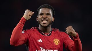 Willy Kambwala of Manchester United celebrates after the Premier League match between Manchester United and Aston Villa at Old Trafford on December 26, 2023 in Manchester, England
