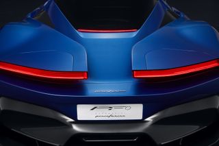 Rear exterior view of blue Pininfarina PFo electric car prototype