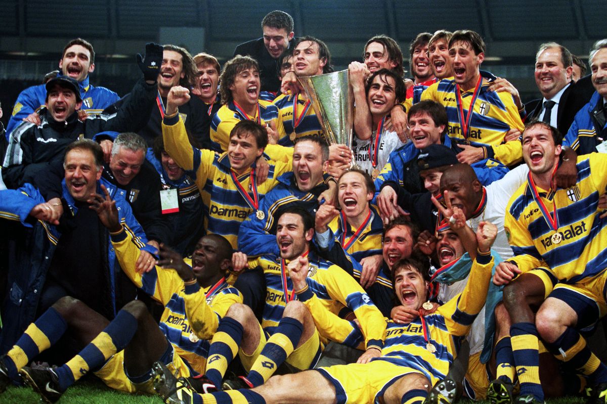 Parma celebrate with the trophy after winning the 1999 UEFA Cup final against Marseille in Moscow