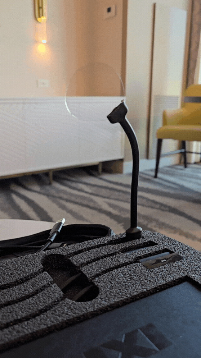 An IXI smart lens winks in and out of view