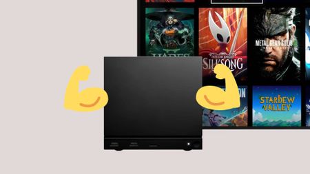 Steam Machine next to screen with library art work and emoji flexing arms on sides.
